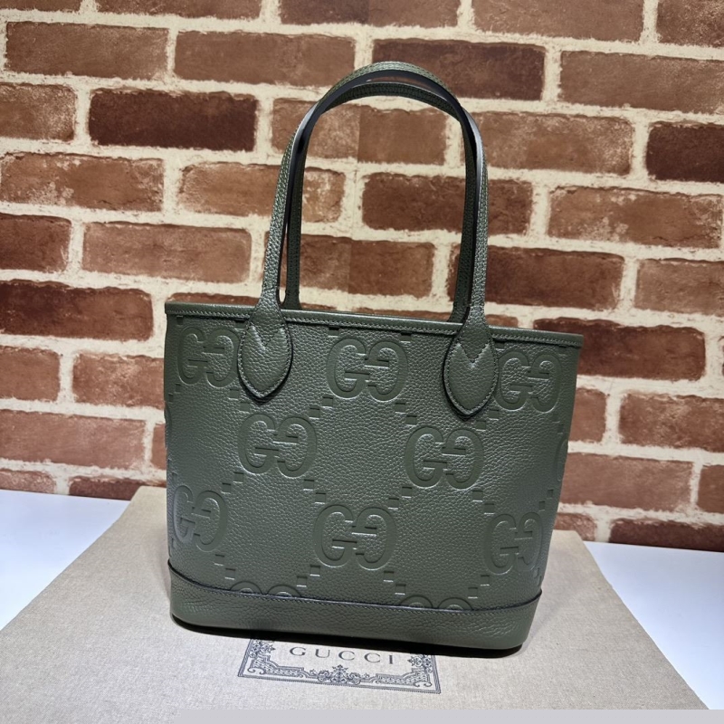 G*u*i shopping bags